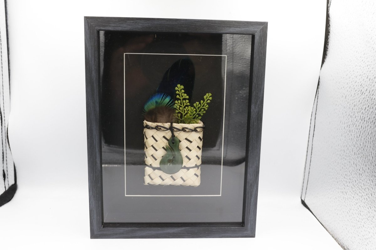 Framed New Zealand Greenstone Fish Hook with Feathers & Kete
