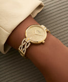 GUESS Ladies Gold Tone Coral Gltiz Analog Watch GW0868L2