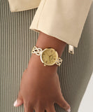 GUESS Ladies Gold Tone Coral Gltiz Analog Watch GW0868L2