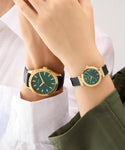 GUESS Ladies Black Gold Tone Array Analog Watch GW0912L4