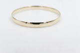 9ct Gold Solid bangle 6.5mm wide SYB27