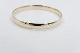 9ct Gold Solid bangle 7.4mm wide SYB29