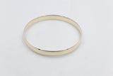 9ct Gold Solid bangle 7.4mm wide SYB29