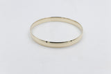 9ct Gold Solid bangle 7.4mm wide SYB29