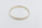 9ct Gold Solid bangle 7.4mm wide SYB29