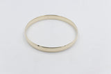 9ct Gold Solid bangle 7.4mm wide SYB29