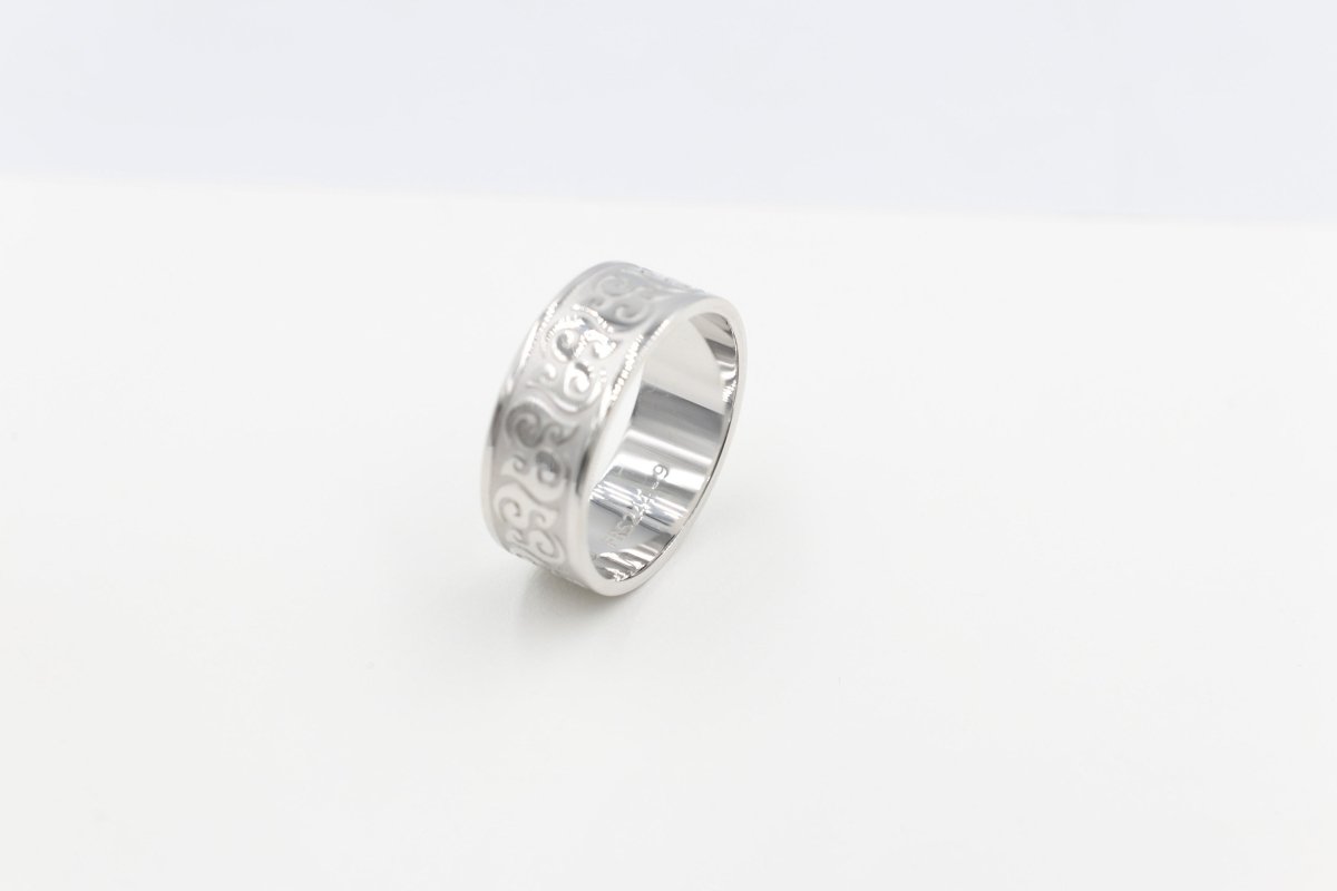 Stg Silver Band with Maori design 9mm wide FR5244S