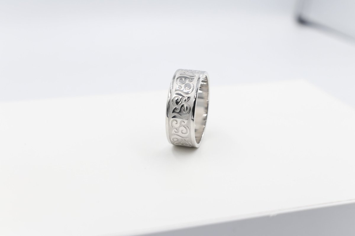 Stg Silver Band with Maori design 9mm wide FR5244S