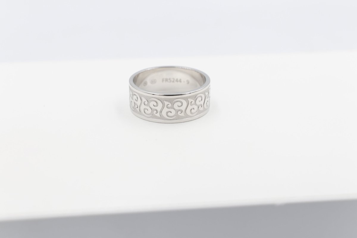 Stg Silver Band with Maori design 9mm wide FR5244S