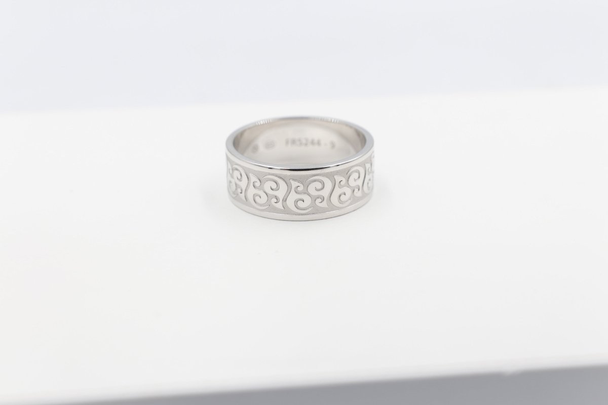 Stg Silver Band with Maori design 9mm wide FR5244S