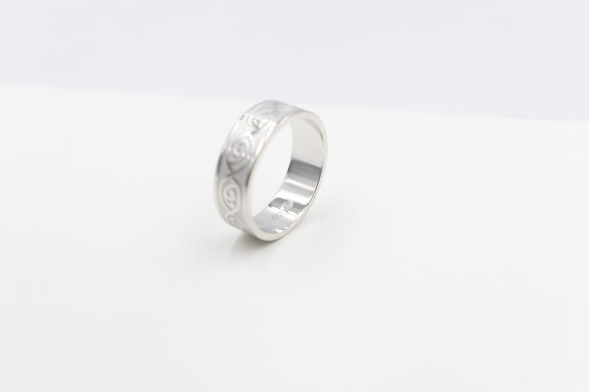 Stg Silver Band with Maori design 7mm FR5250S