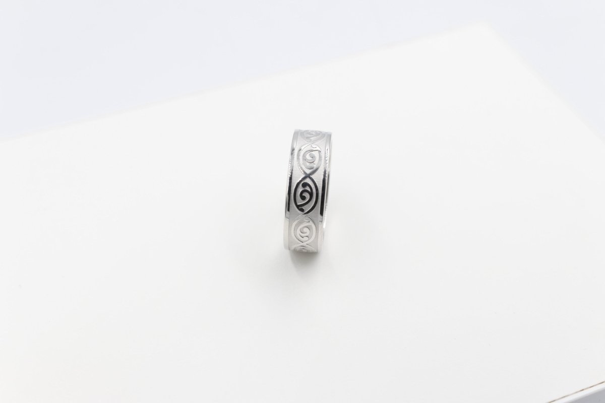 Stg Silver Band with Maori design 7mm FR5250S