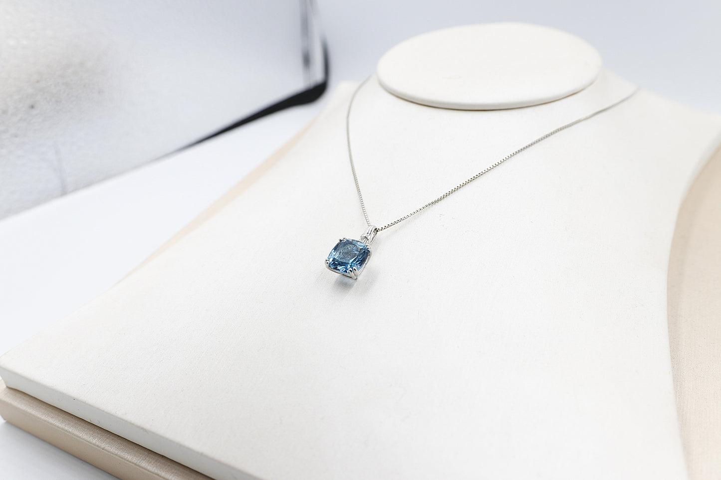 9ct White Gold Blue Topaz and Diamond Pendent 28660A