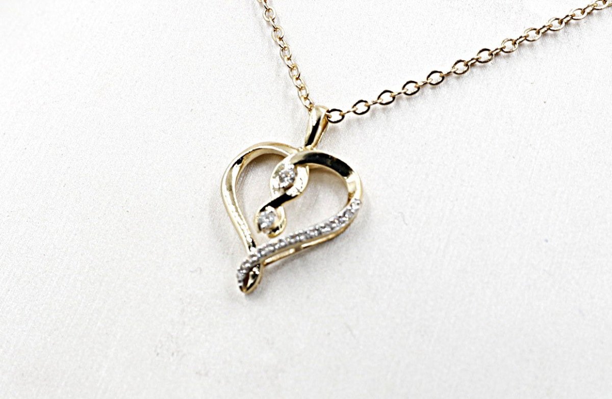 10K Gold Diamond Heart Pendent SKP46616