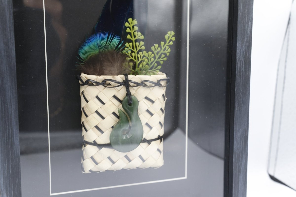 Framed New Zealand Greenstone Fish Hook with Feathers & Kete