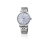 Silver Seiko watch with a white face on a white background