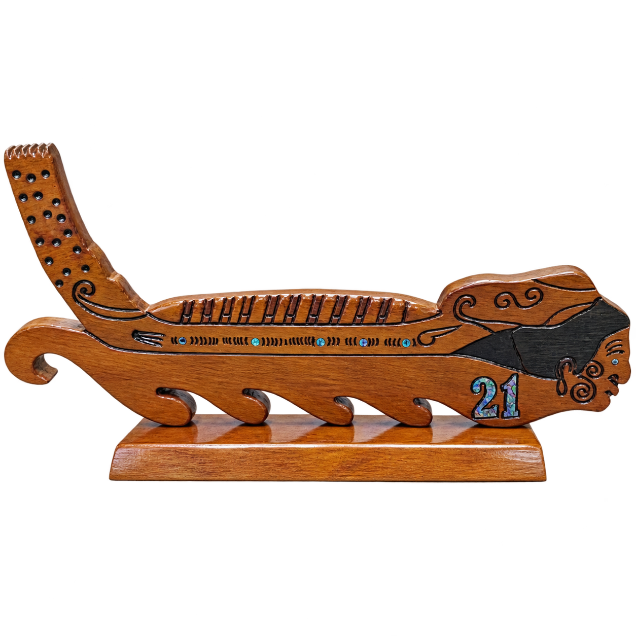 Handmade Swamp Kauri Waka 21st Key on stand 570mm