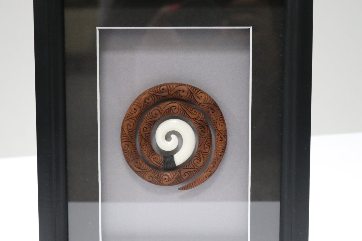 Framed Bone and Wood Carvings