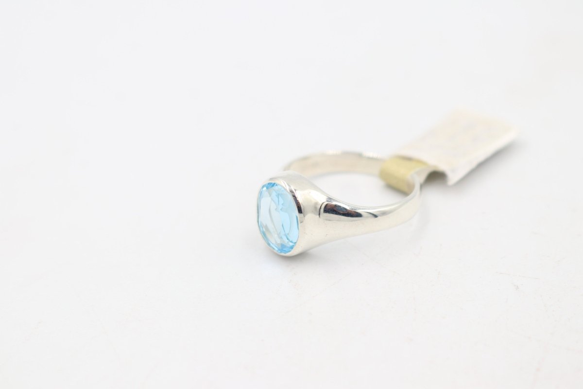 Stg Silver Blue Topaz Ring with Dolphin Etching