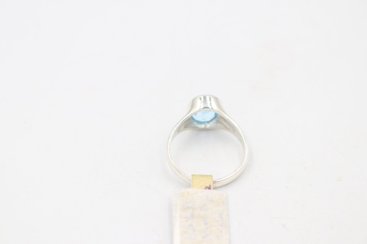 Stg Silver Blue Topaz Ring with Dolphin Etching
