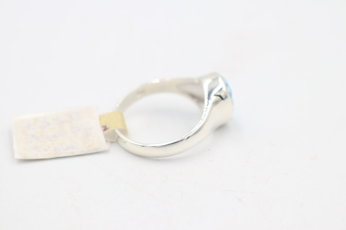 Stg Silver Blue Topaz Ring with Dolphin Etching