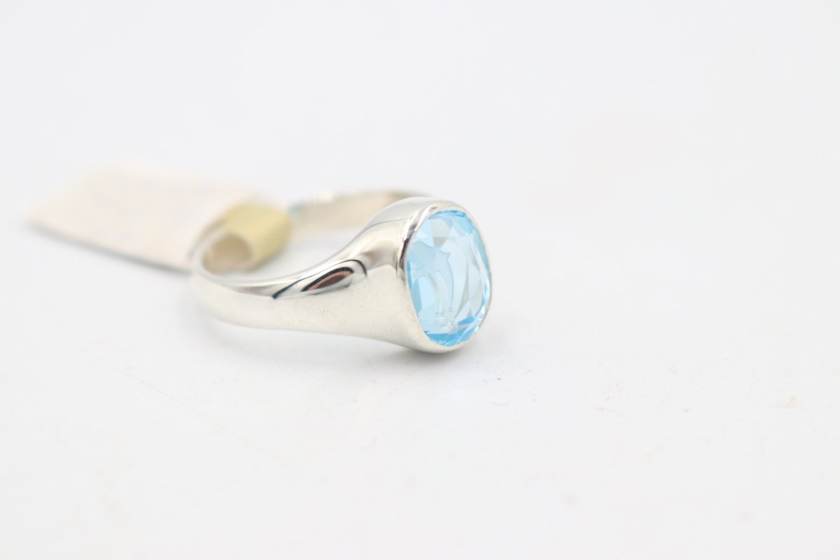 Stg Silver Blue Topaz Ring with Dolphin Etching