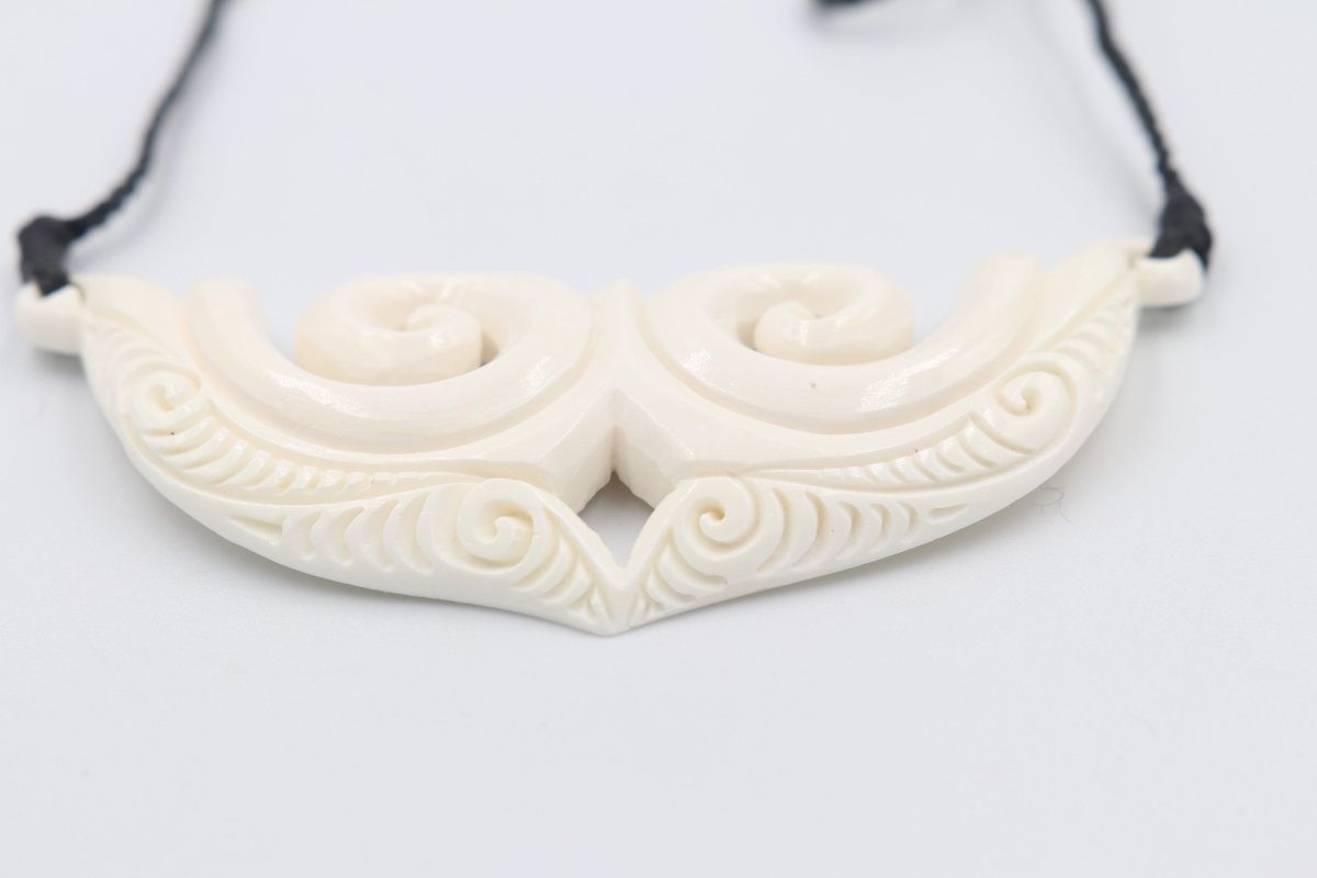 Bone Koru pendent