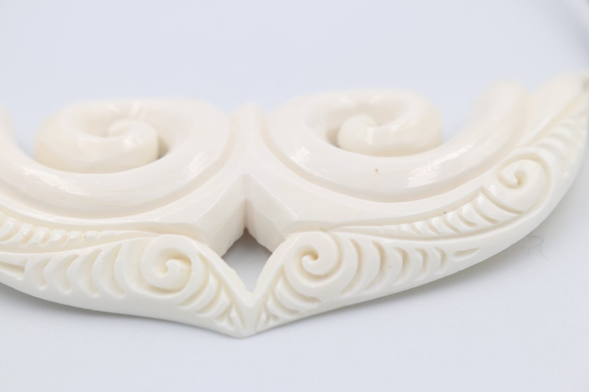 Bone Koru pendent