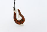 Bone Hook Pendant with Stunning Detailing