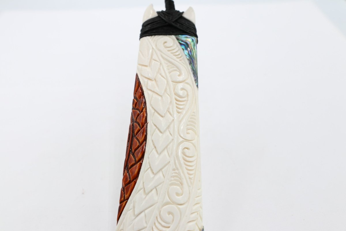 Bone Toki with Paua and Stain.