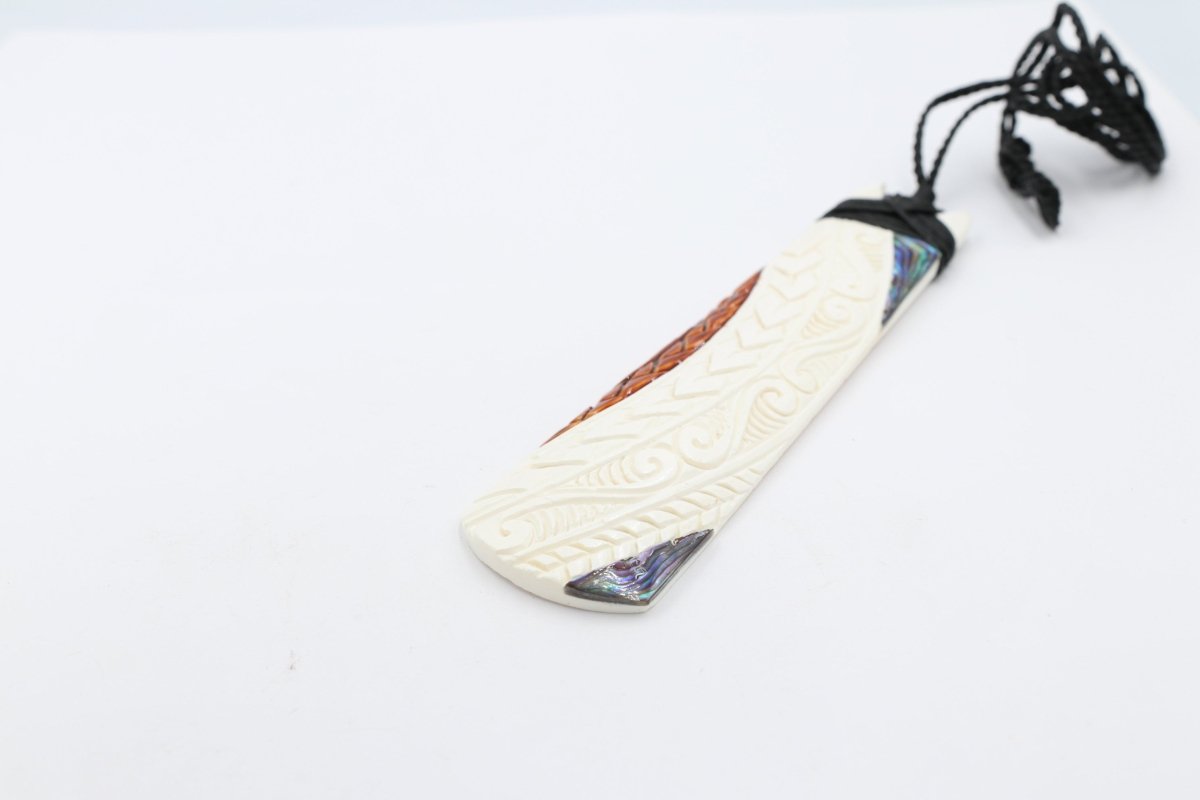 Bone Toki with Paua and Stain.