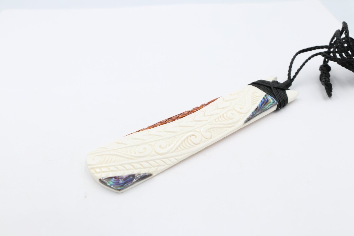 Bone Toki with Paua and Stain.