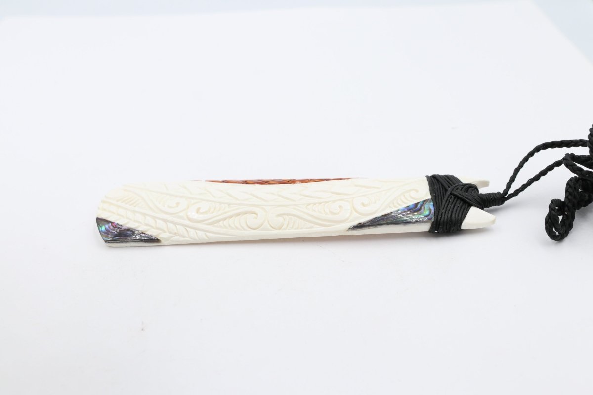 Bone Toki with Paua and Stain.