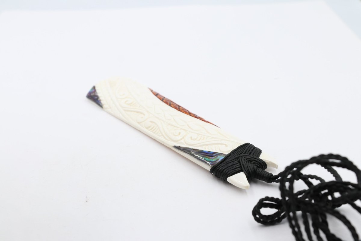 Bone Toki with Paua and Stain.