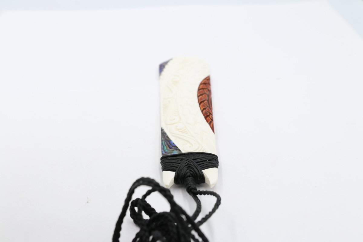 Bone Toki with Paua and Stain.