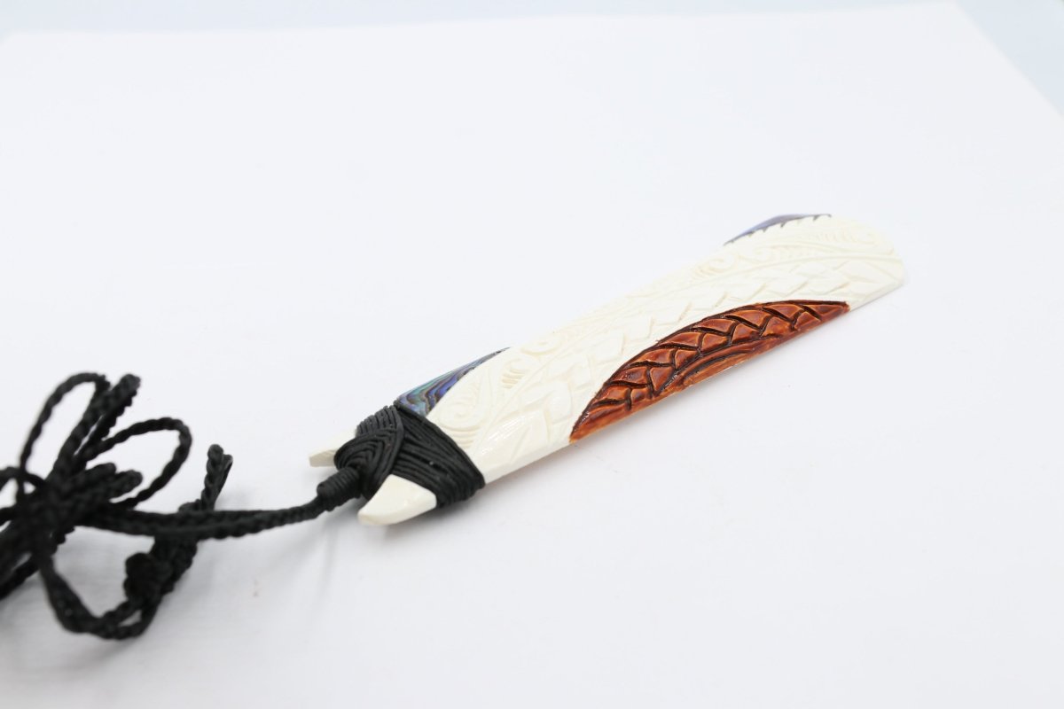 Bone Toki with Paua and Stain.