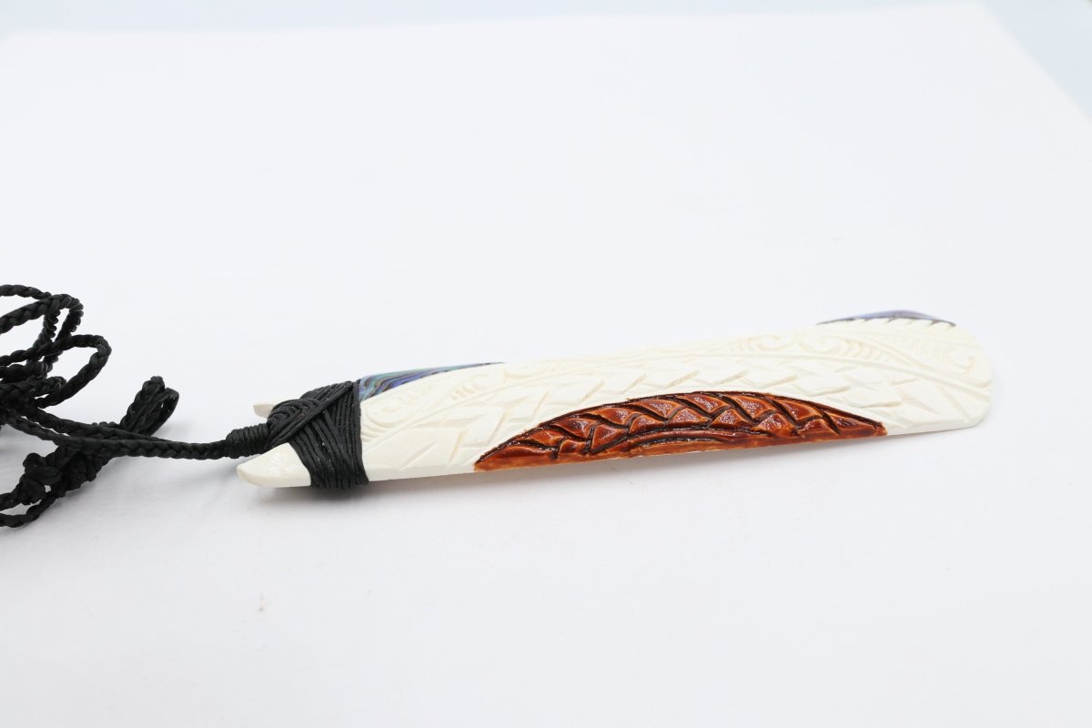 Bone Toki with Paua and Stain.