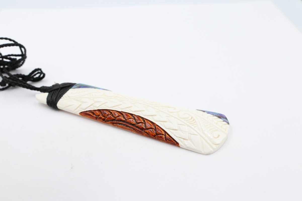 Bone Toki with Paua and Stain.