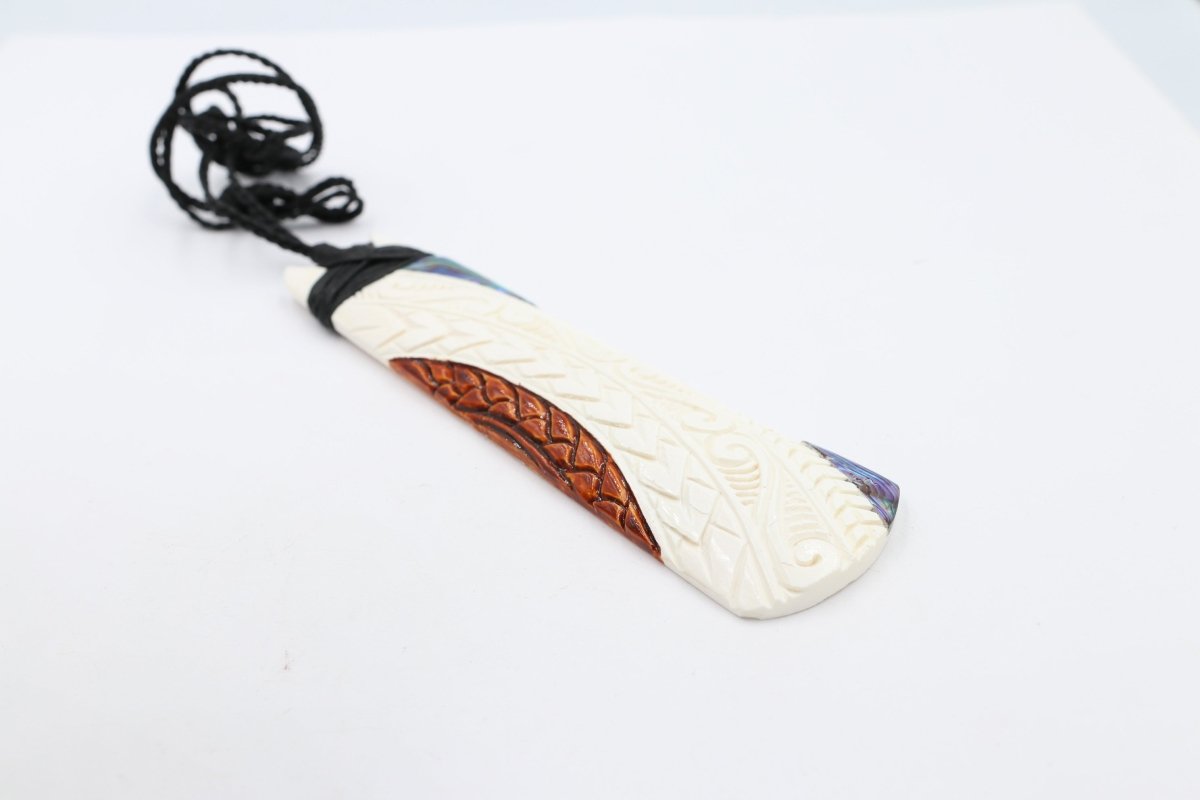 Bone Toki with Paua and Stain.