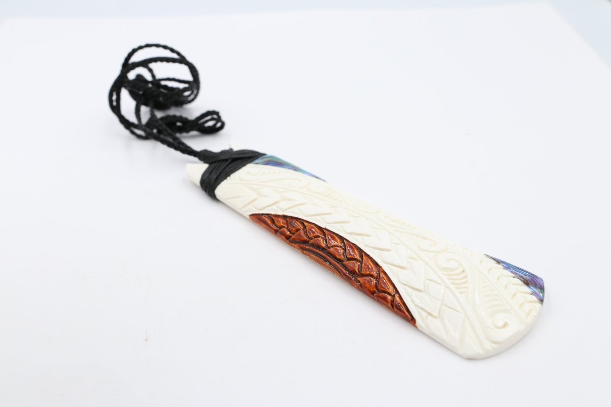 Bone Toki with Paua and Stain.