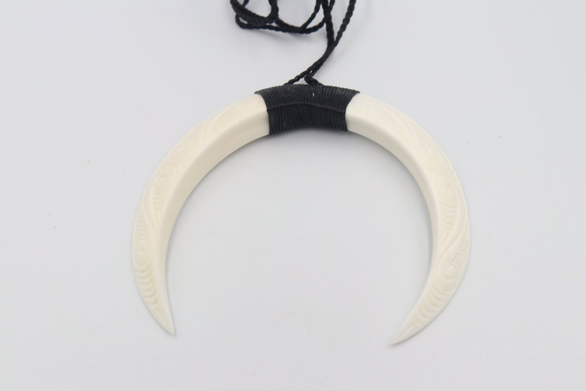 Double Bound Pig Bone Tusk