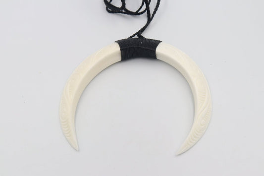Double Bound Pig Bone Tusk
