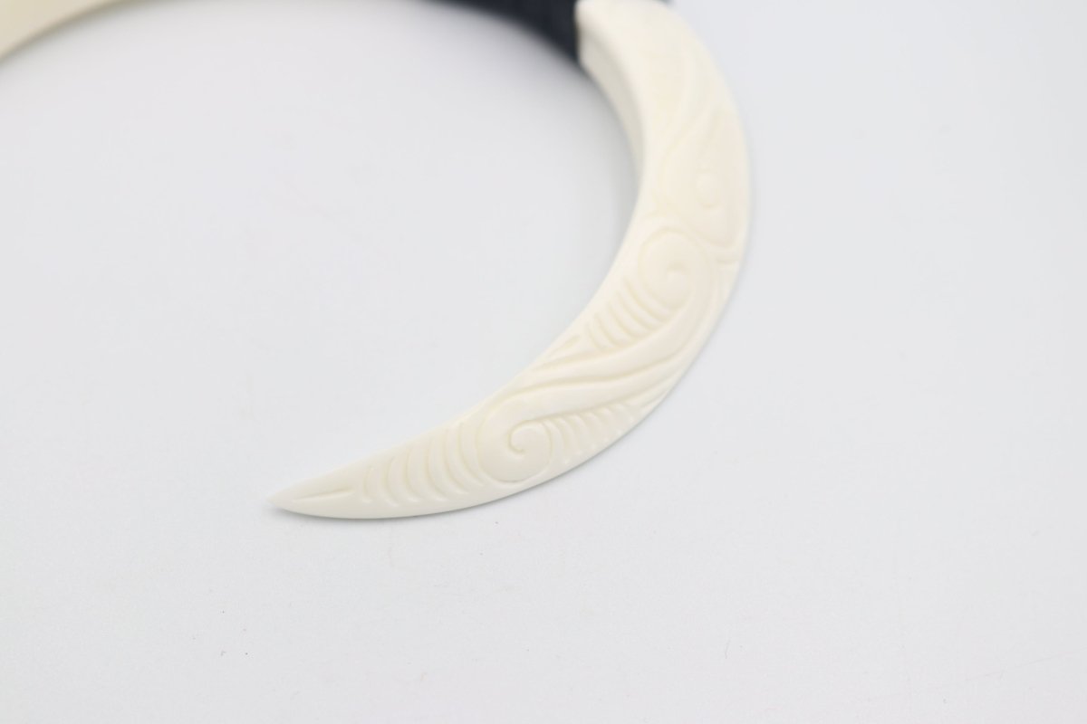 Double Bound Pig Bone Tusk