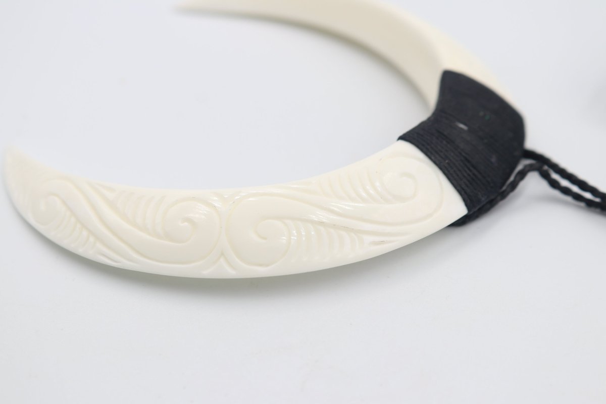 Double Bound Pig Bone Tusk