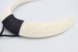 Double Bound Pig Bone Tusk