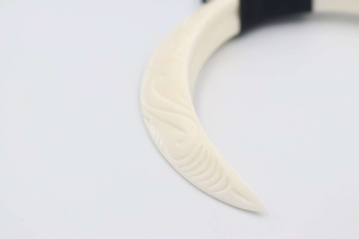 Double Bound Pig Bone Tusk