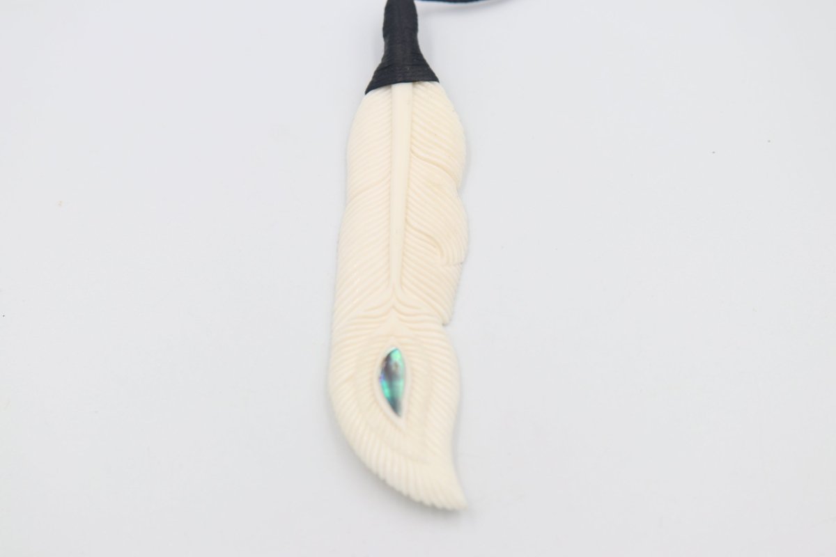 Bound Bone feather pendent with Paua