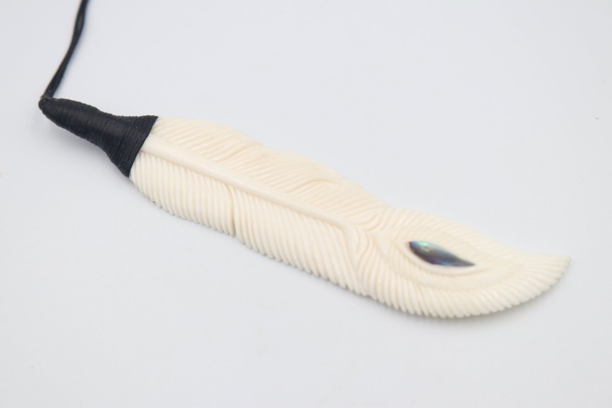 Bound Bone feather pendent with Paua