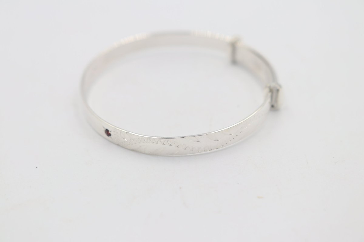 Sterling Silver Childs Patterned Expander with garnet