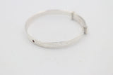 Sterling Silver Childs Patterned Expander with garnet